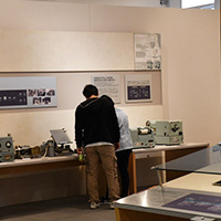 Visitors viewing exhibits at the telegram corner